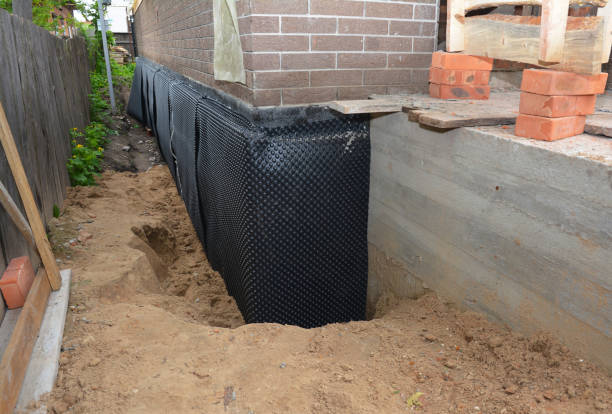 Happy homeowners after waterproofing job in Lyndhurst
